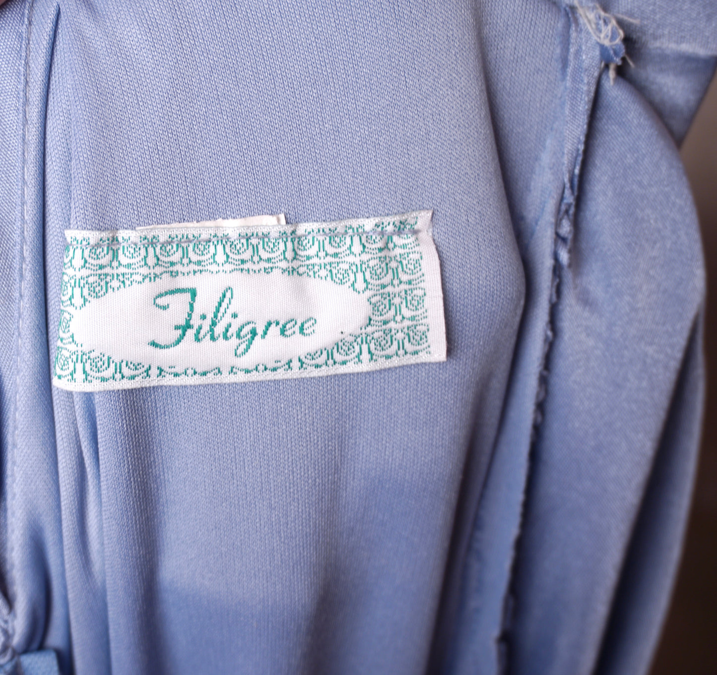Filigree klänning – ljusblå draperad 80s
